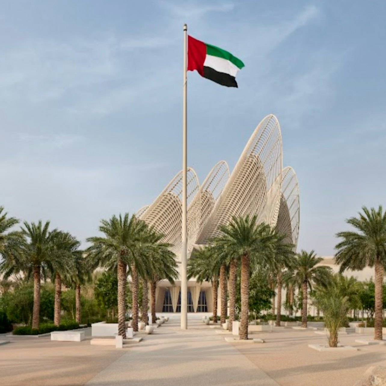 Exterior facade of the museum with the United Arab Emirates flag